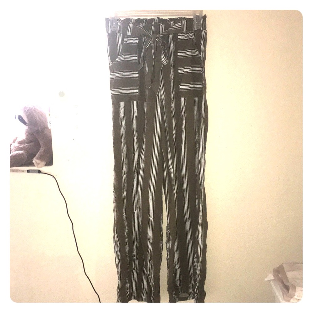 Loose green pants.